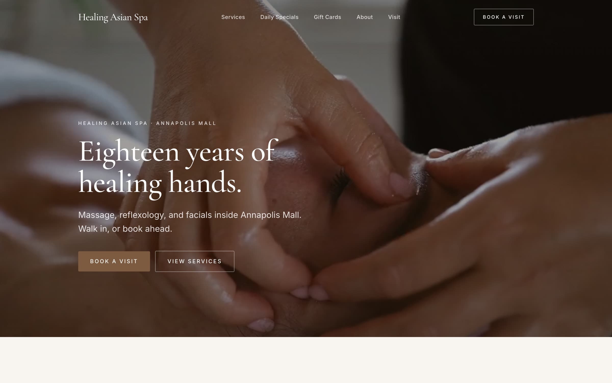 Healing Asian Spa live demo homepage: a warm close-up of healing hands during a treatment, with an Eighteen years of healing hands headline and a Book a Visit button.